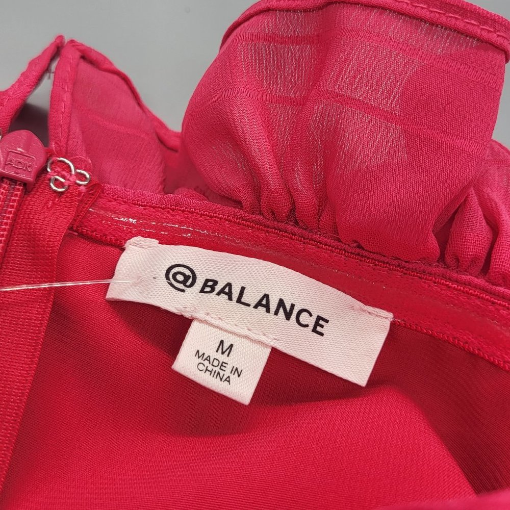 @Balance Lily Ruffle Romper in Fuschia - Picture 8 of 9